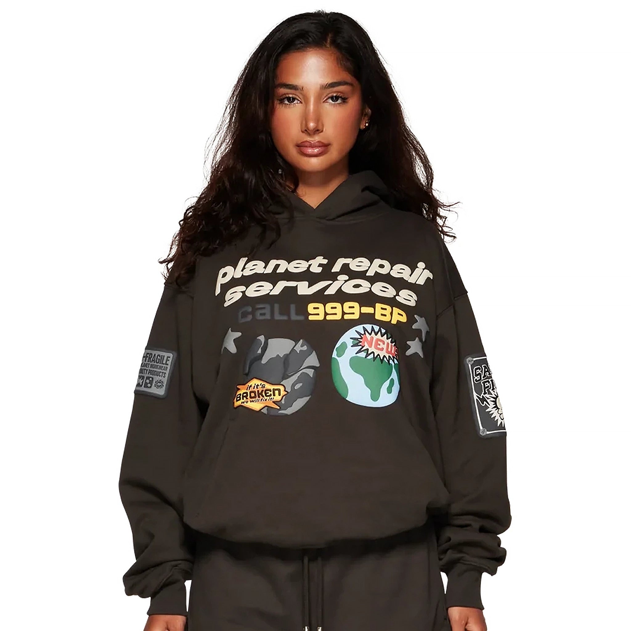 Model female front view of Broken Planet Repair Services Soot Black Hoodie